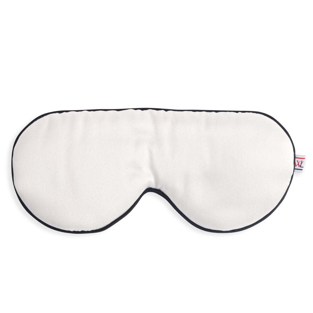 a white silk eye mask